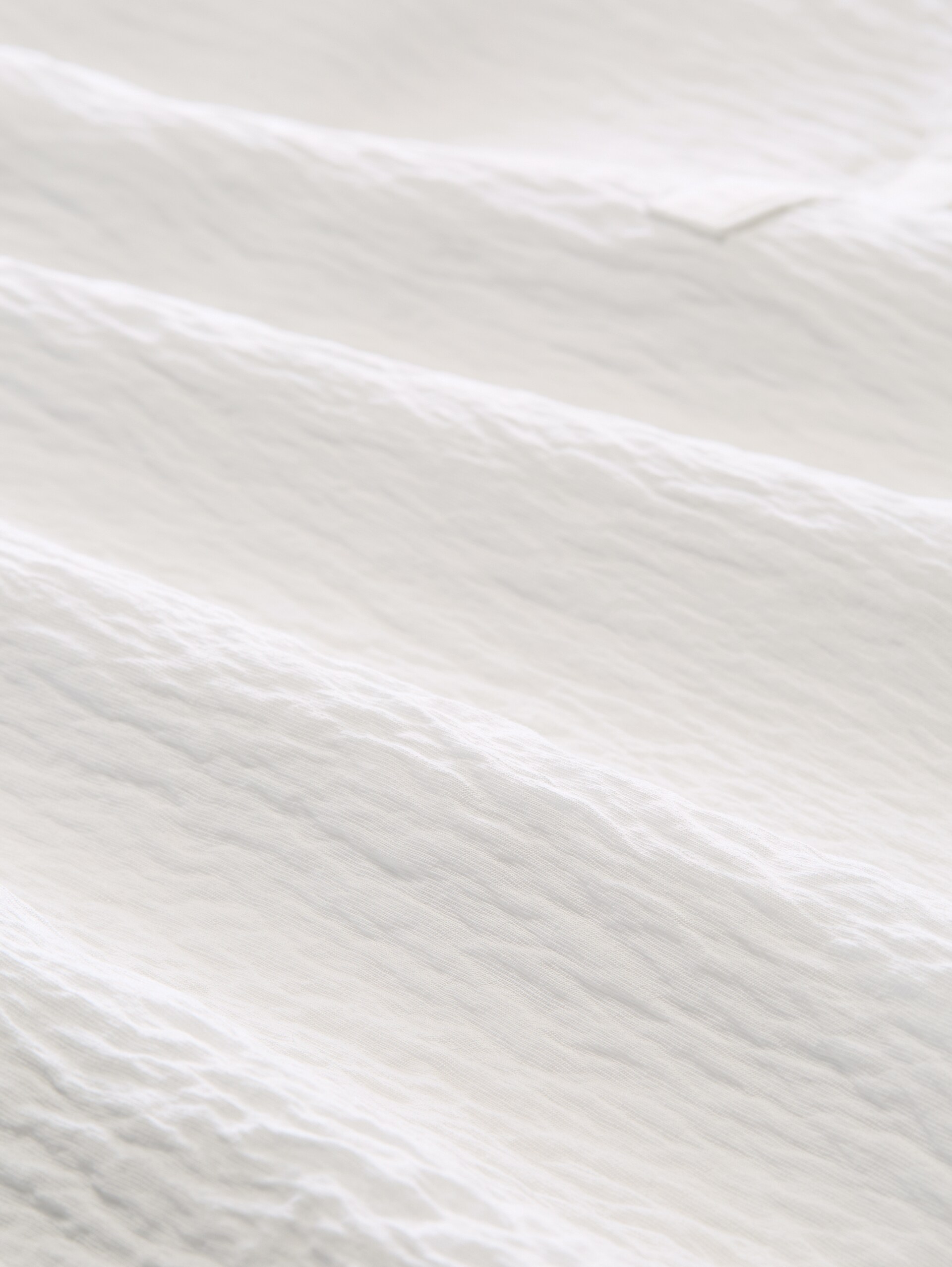 Losvallende blouse met V-hals - Whisper White - Materiaalweergave