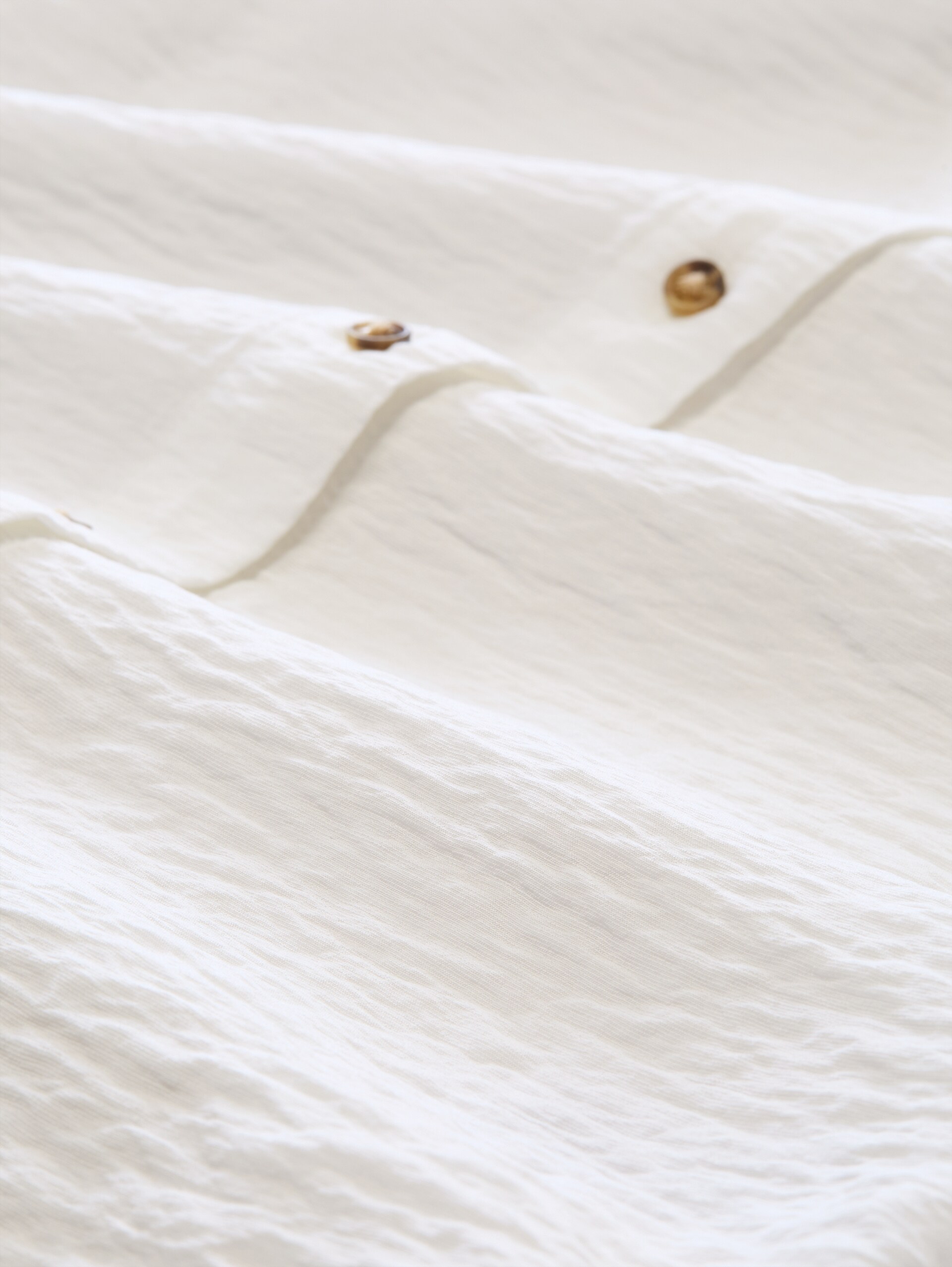 Blusentop mit V-Ausschnitt - Whisper White - Material-Ansicht