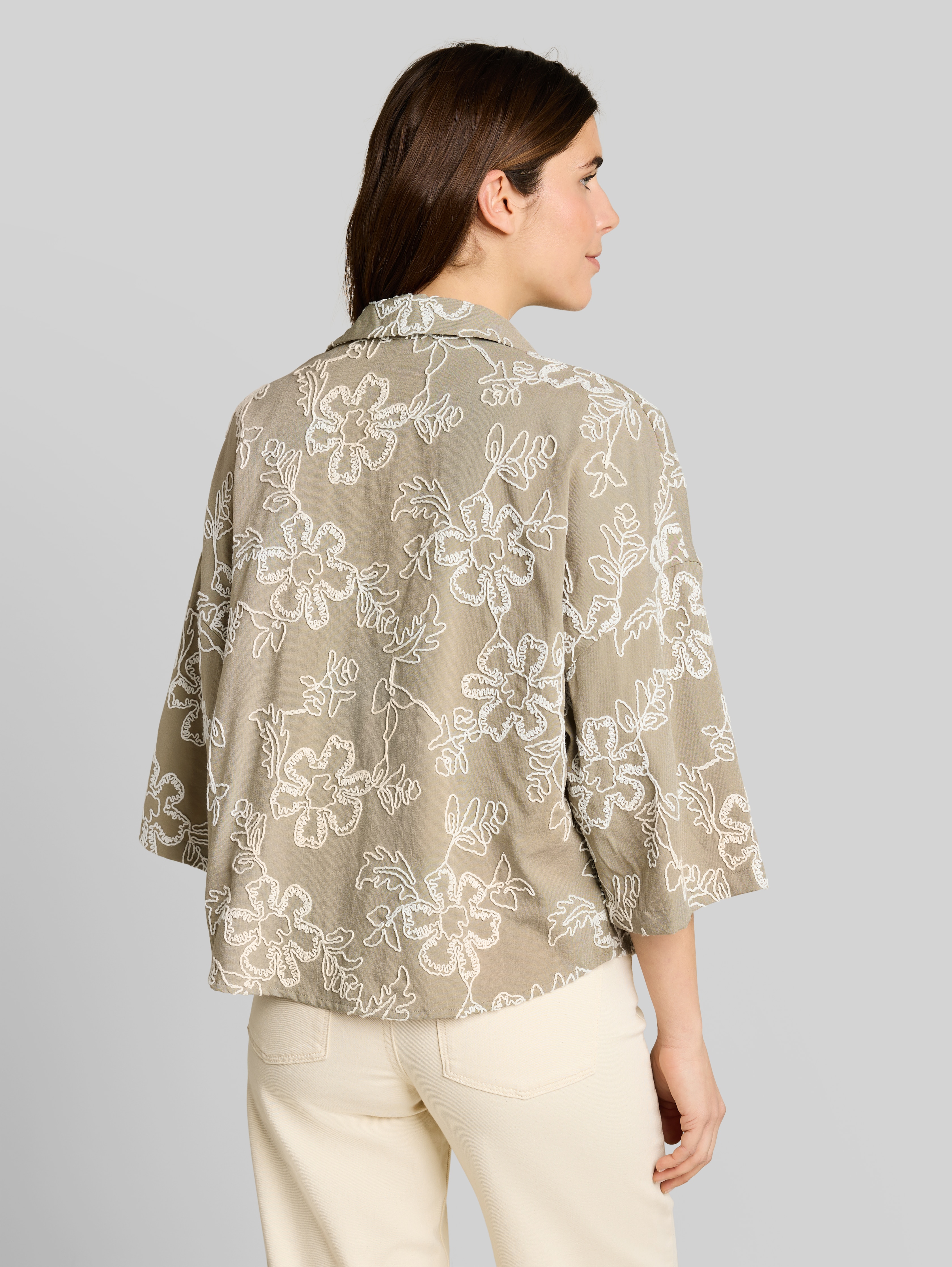 Oversized blouse with floral embroidery in green by Tom Tailor
