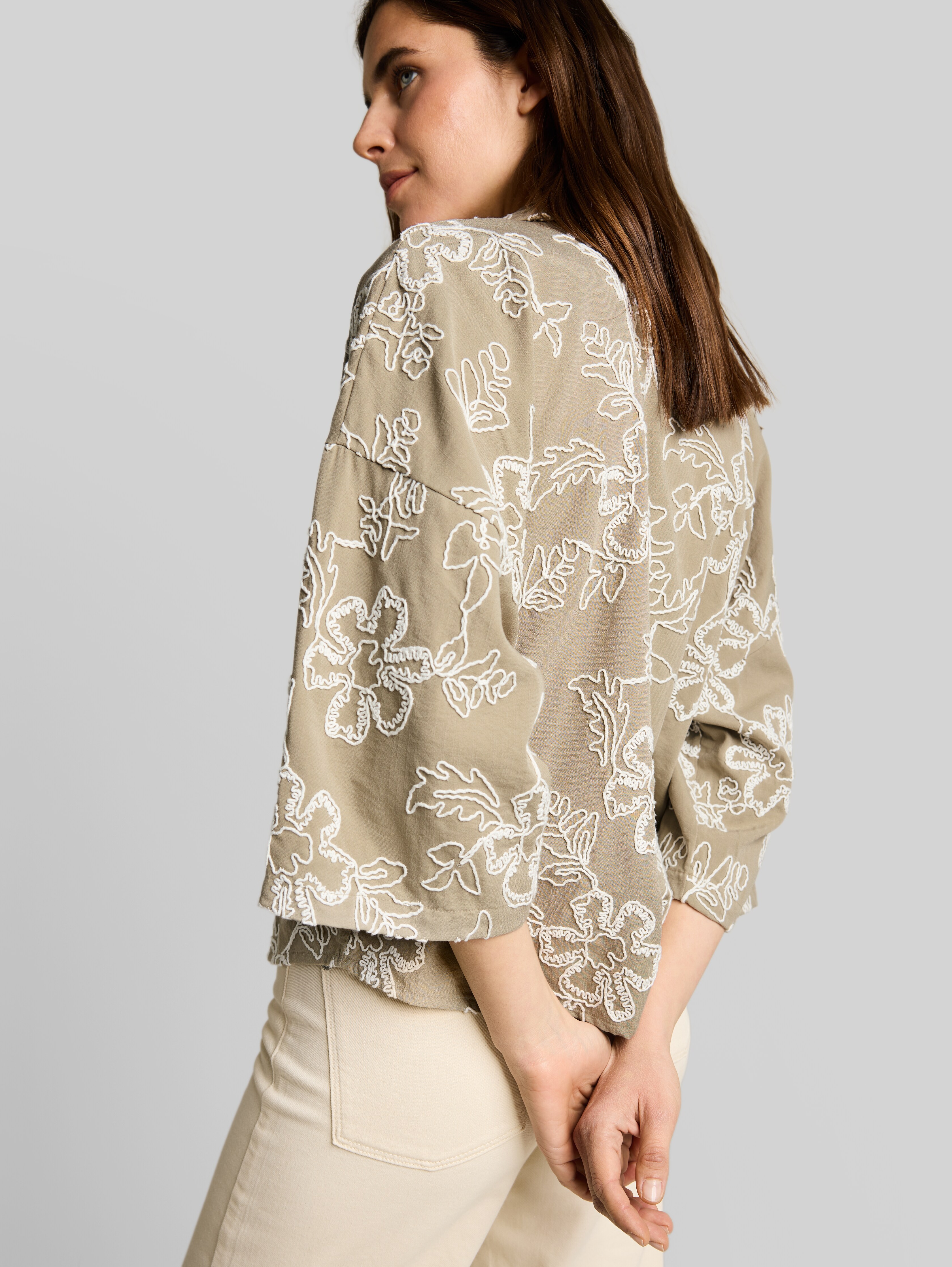 Oversized blouse with floral embroidery in green by Tom Tailor