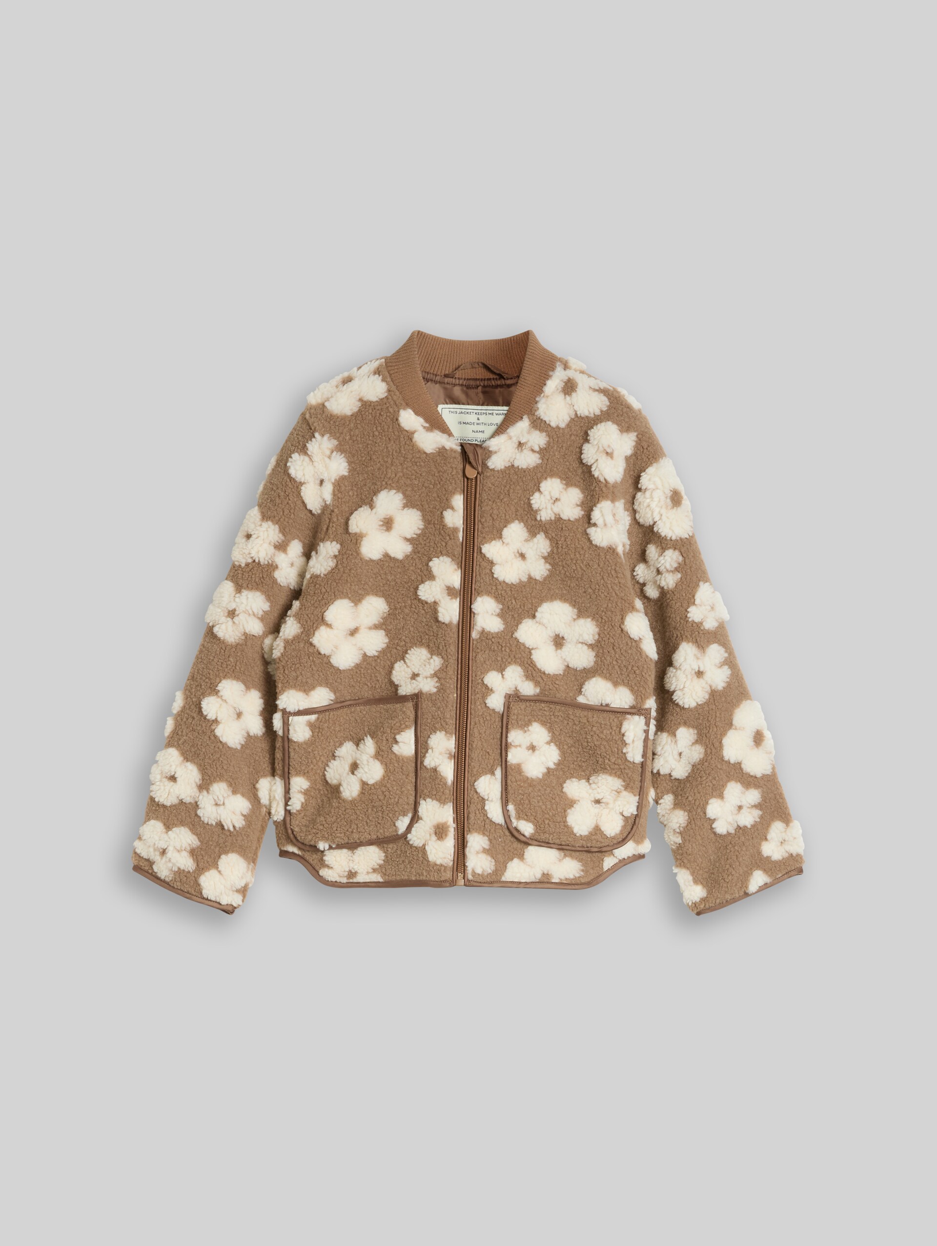 Teddy bomber jacket with floral pattern - brown teddy flower artwork - Front product view