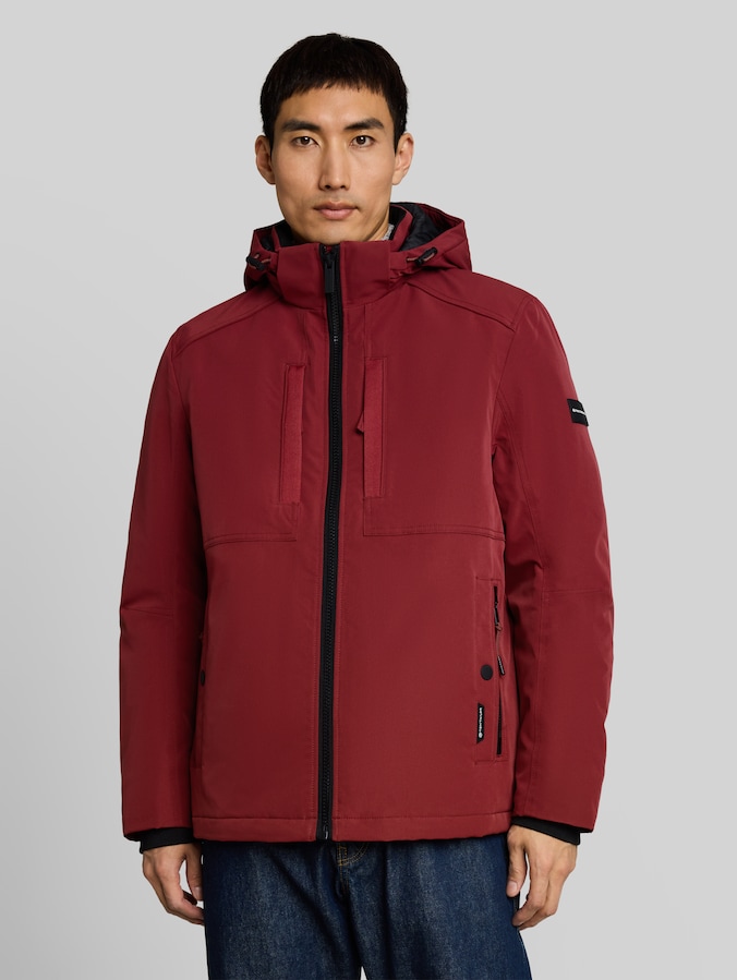 Veste technique à capuche amovible par Men, pear red