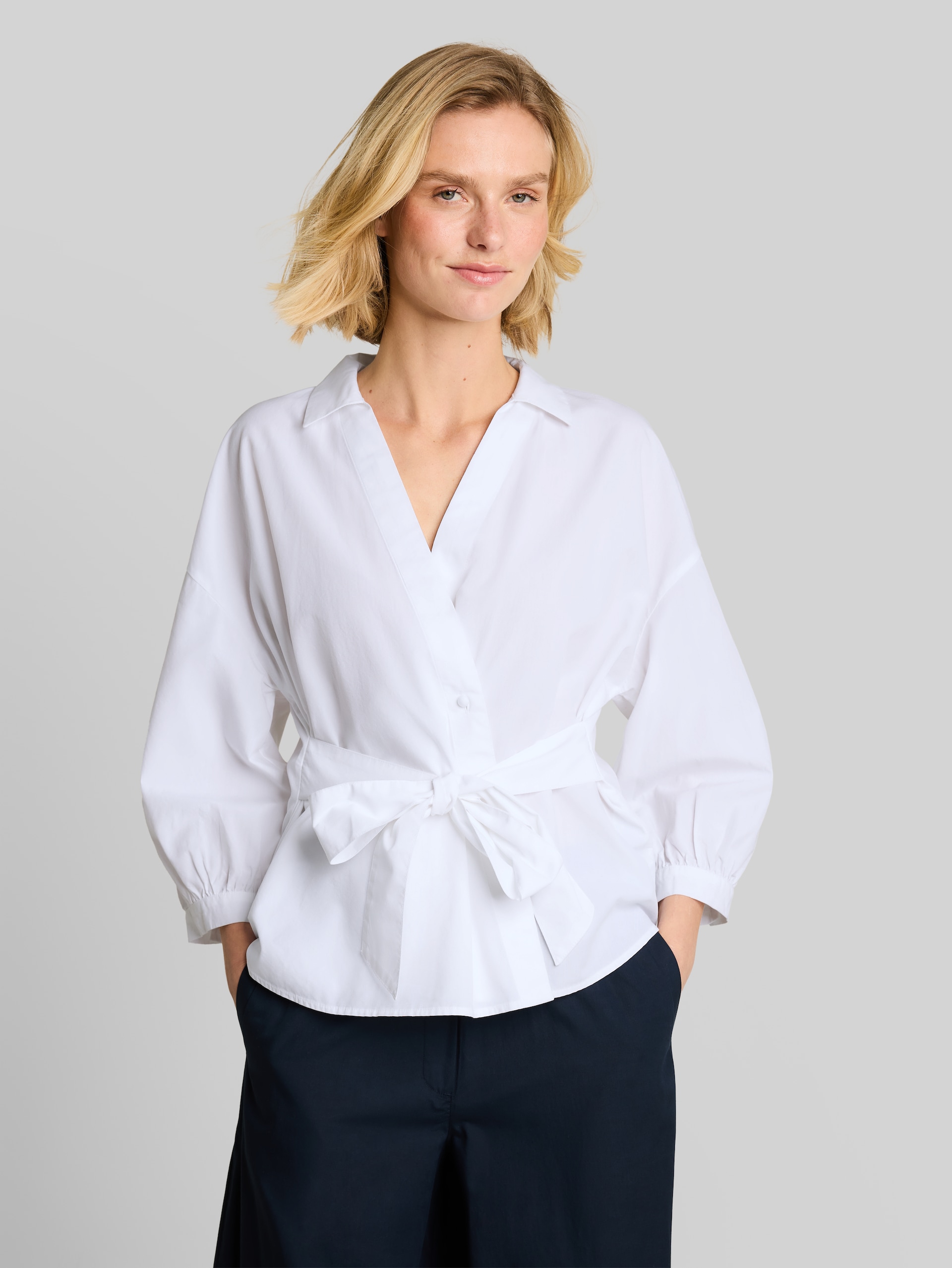 Loose-fit wrap blouse - White - Neckline model front view