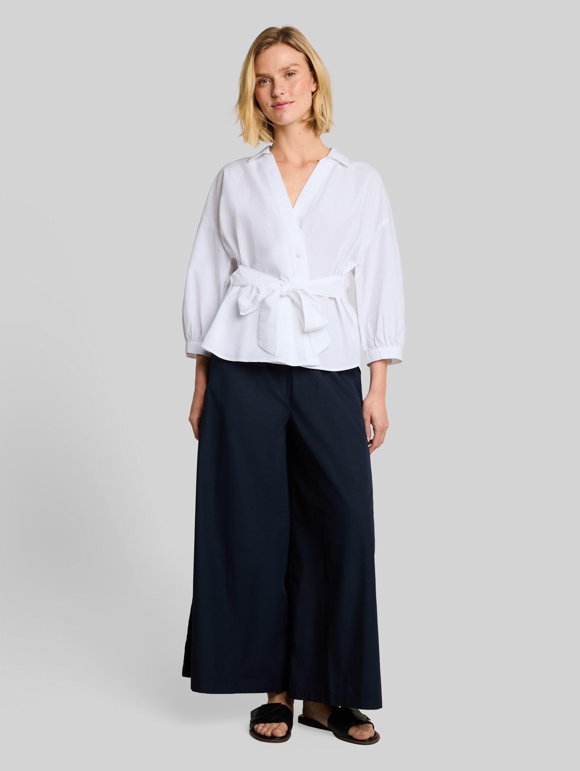 Loose-fit wrap blouse - White - Model front view