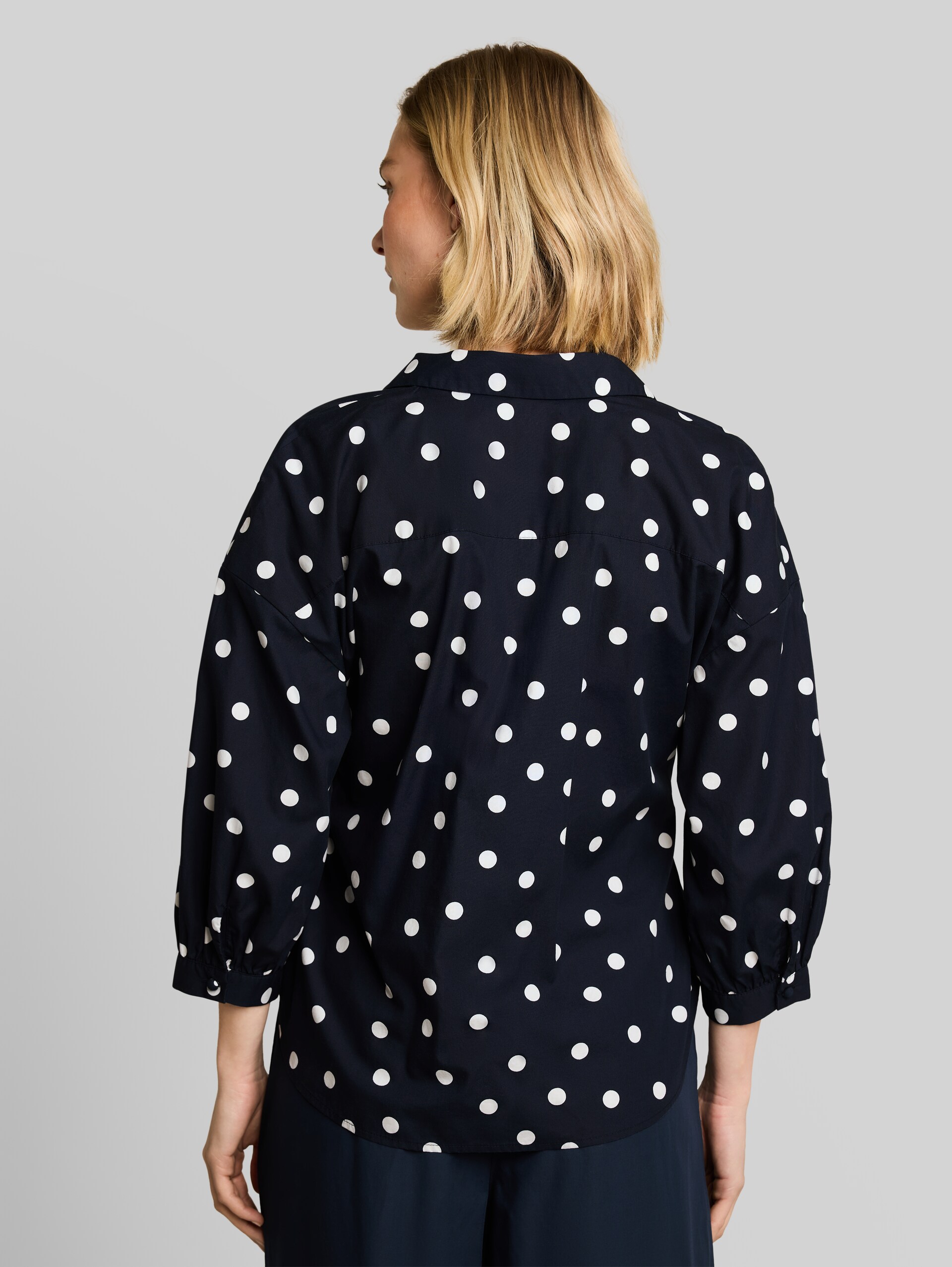 Loose-fit wrap blouse - navy big dot design - Neckline model-back view
