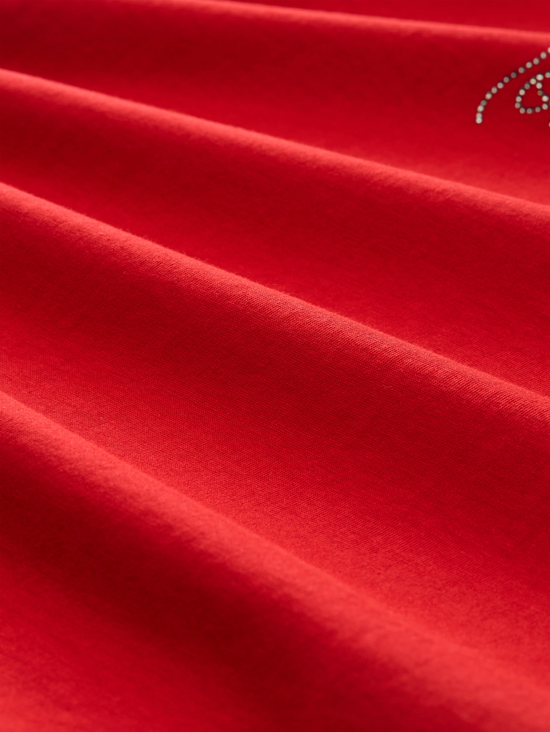 T-Shirt mit Glitzer-Logo - soft scarlet red - Material-Ansicht