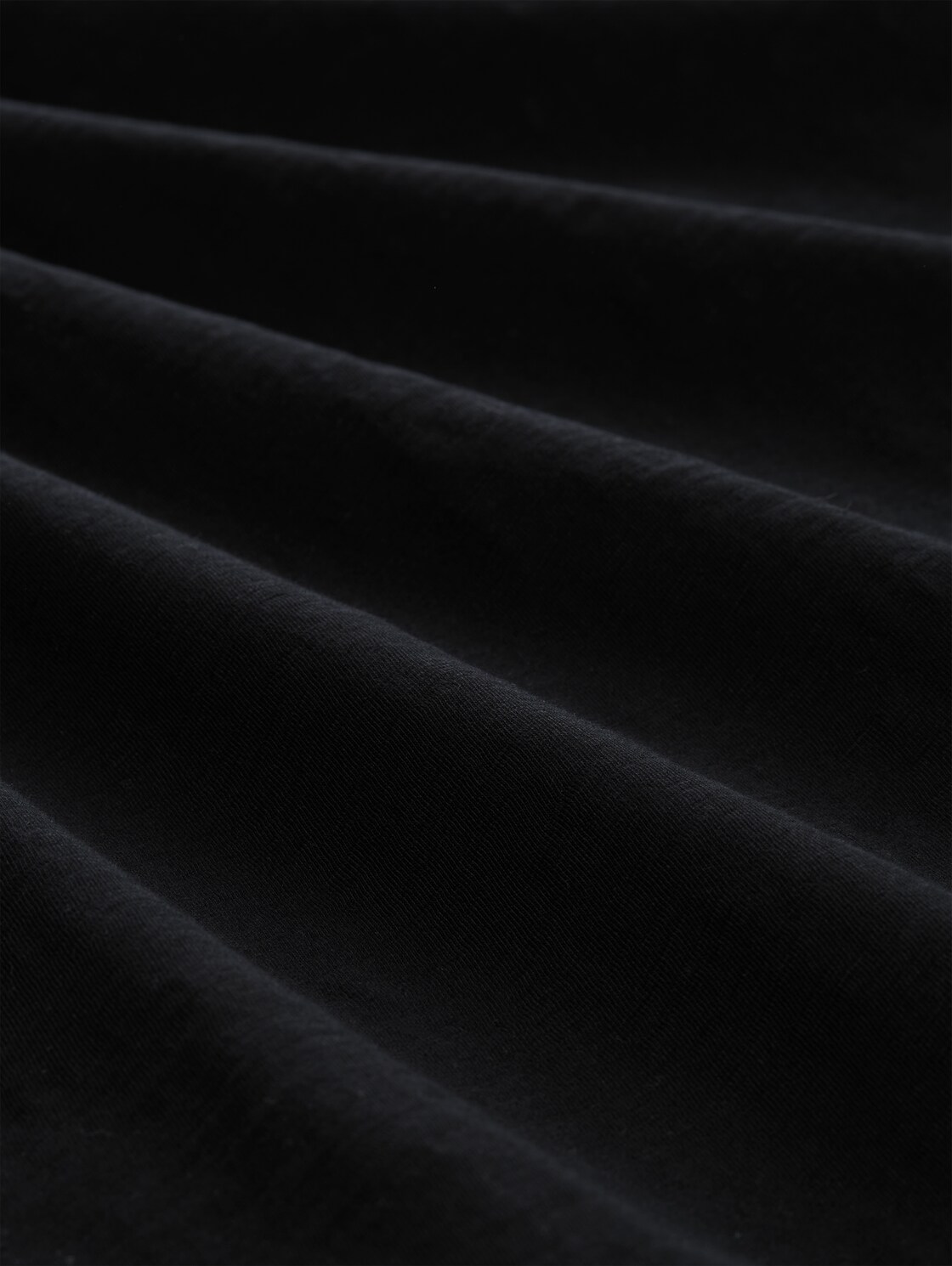 T-Shirt mit Print - Black - Material-Ansicht