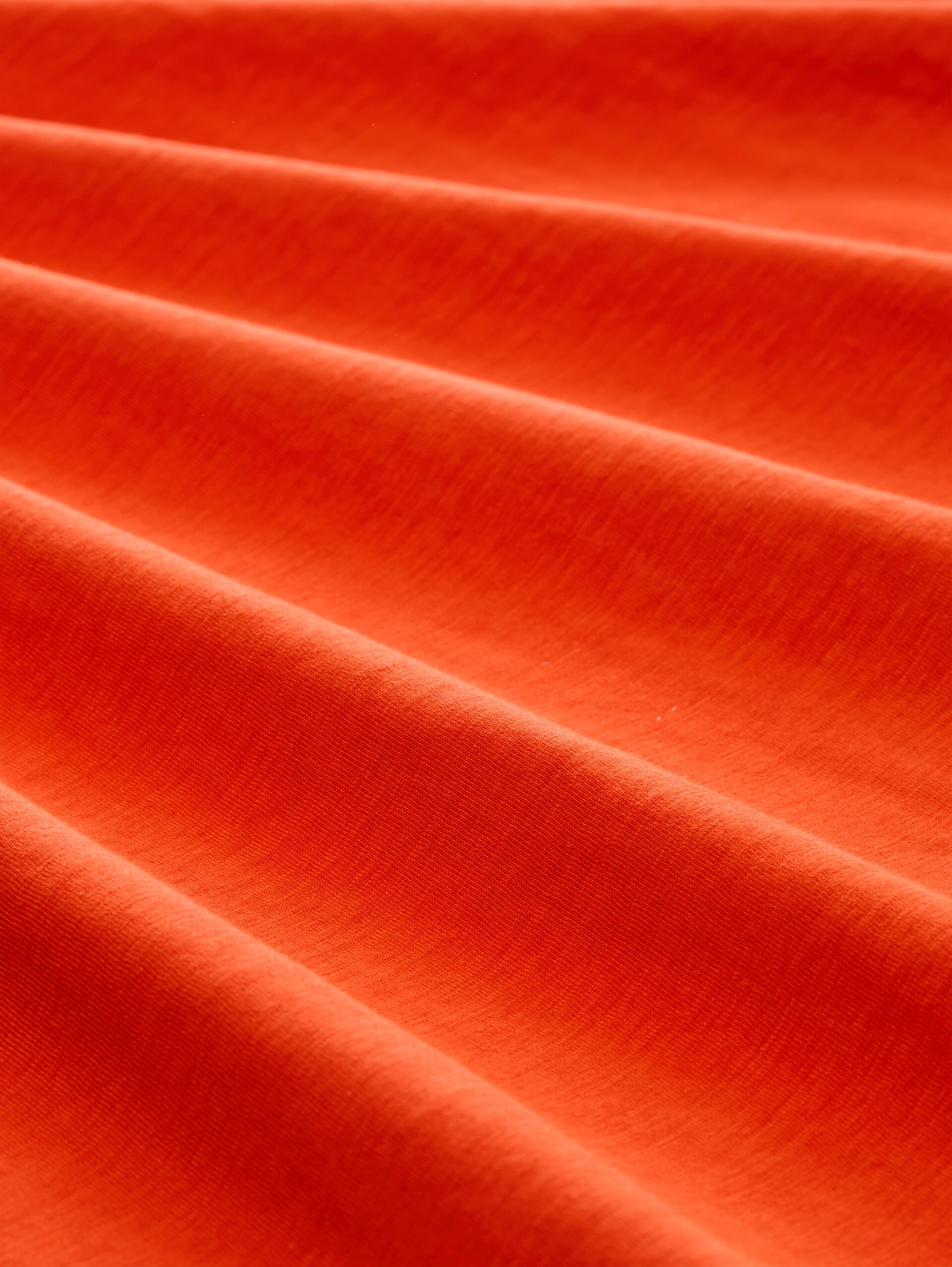 T-shirt met borduursel - orange red - Materiaalweergave