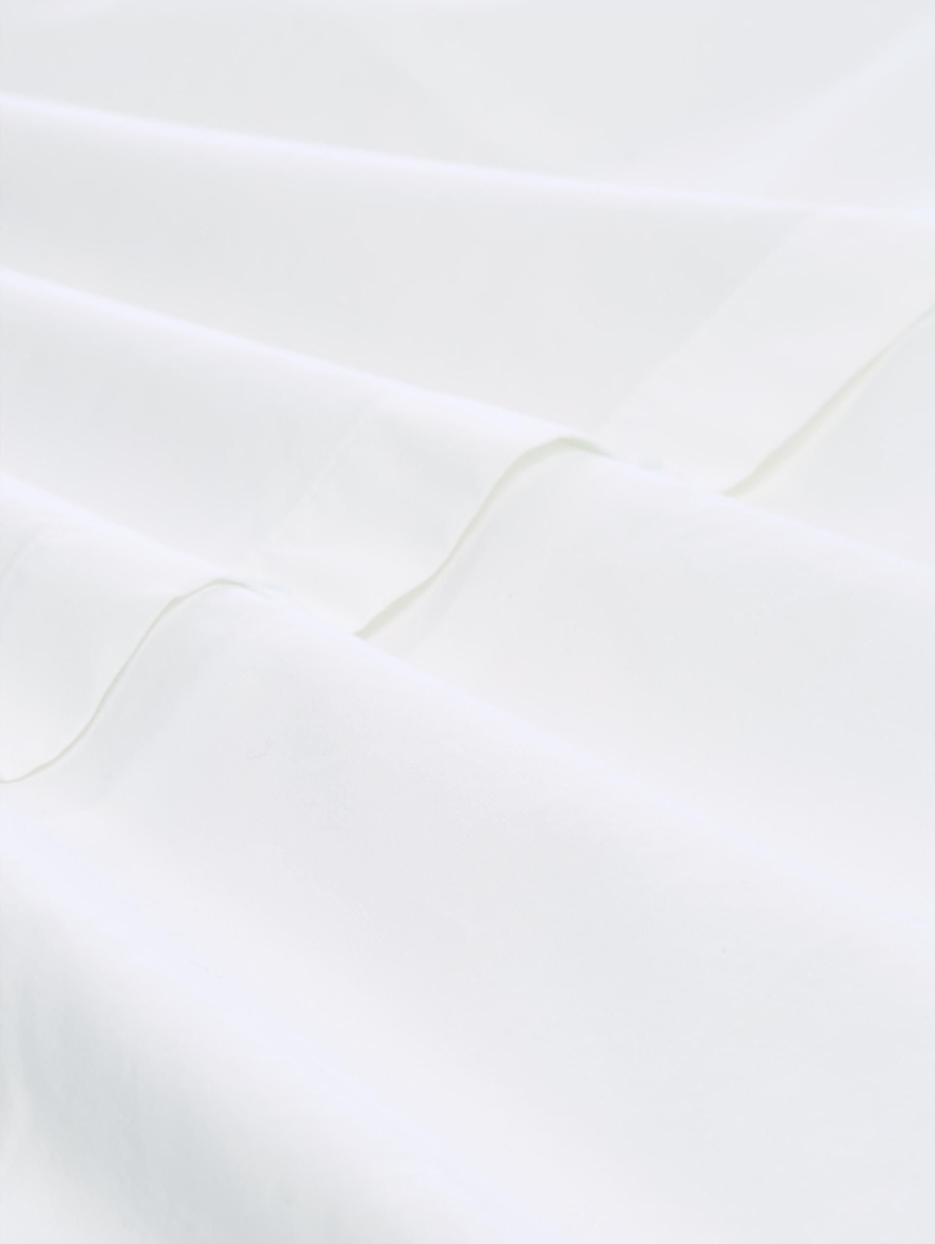 Boxy Fit Hemdbluse aus Baumwolle - White - Material-Ansicht