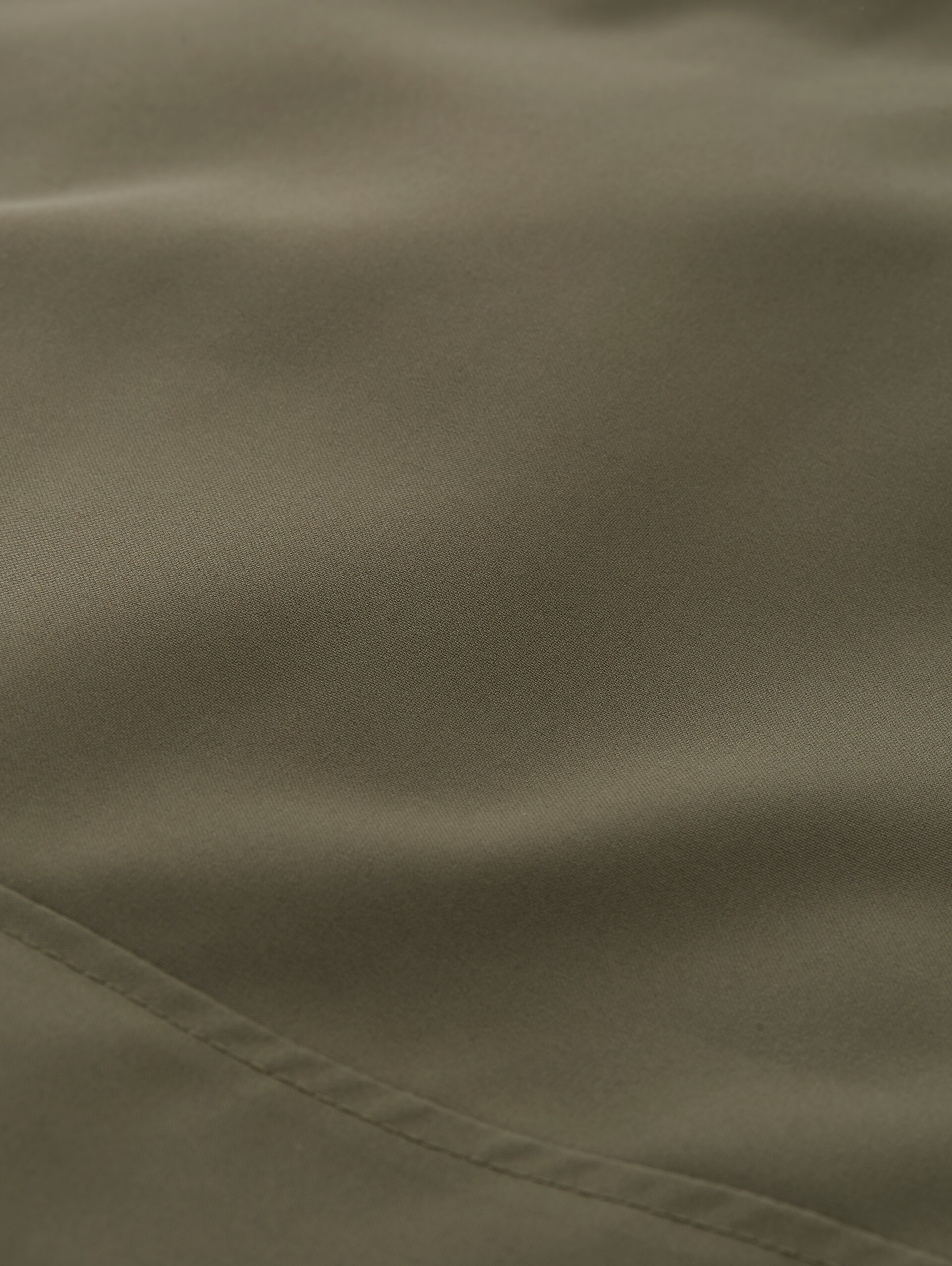 Plus Size - Blouson Jacke mit verstaubarer Kapuze - faded leaf green - Produkt-Detail-Ansicht