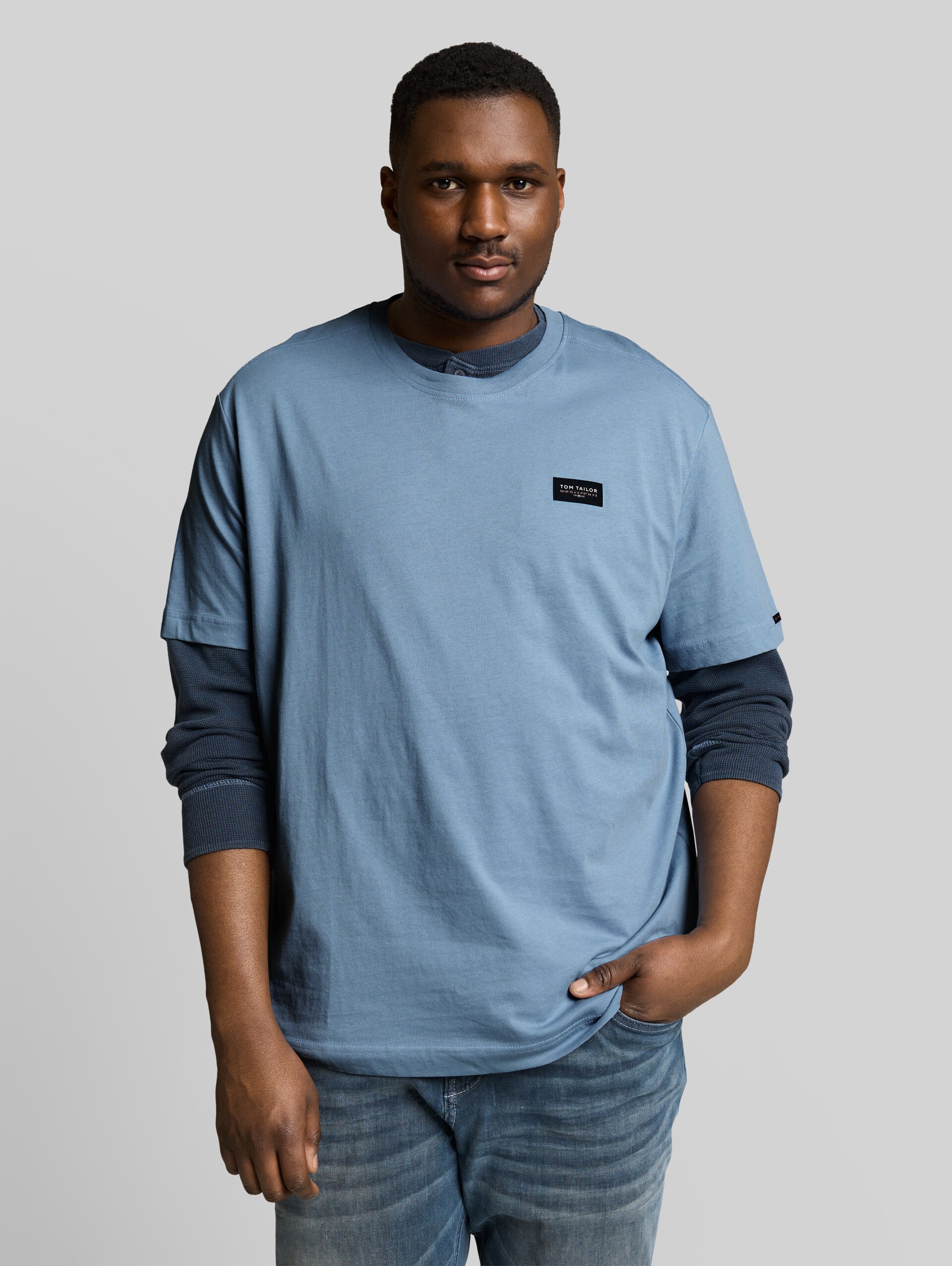 Plus Size - cotton T-shirt with logo badge - mountain spring blue - Neckline model front view