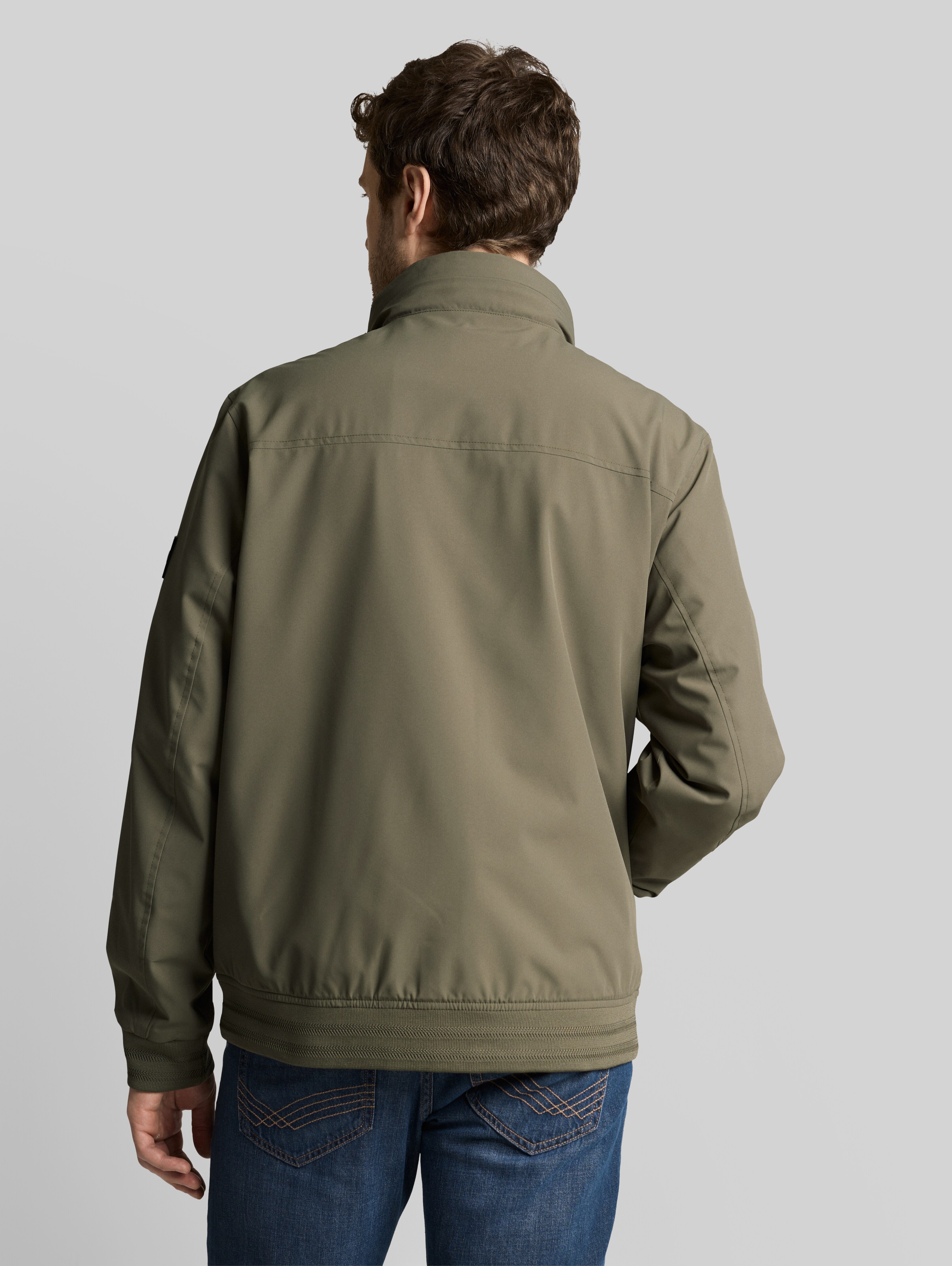 Blouson jacket with stowable hood in green by Tom Tailor