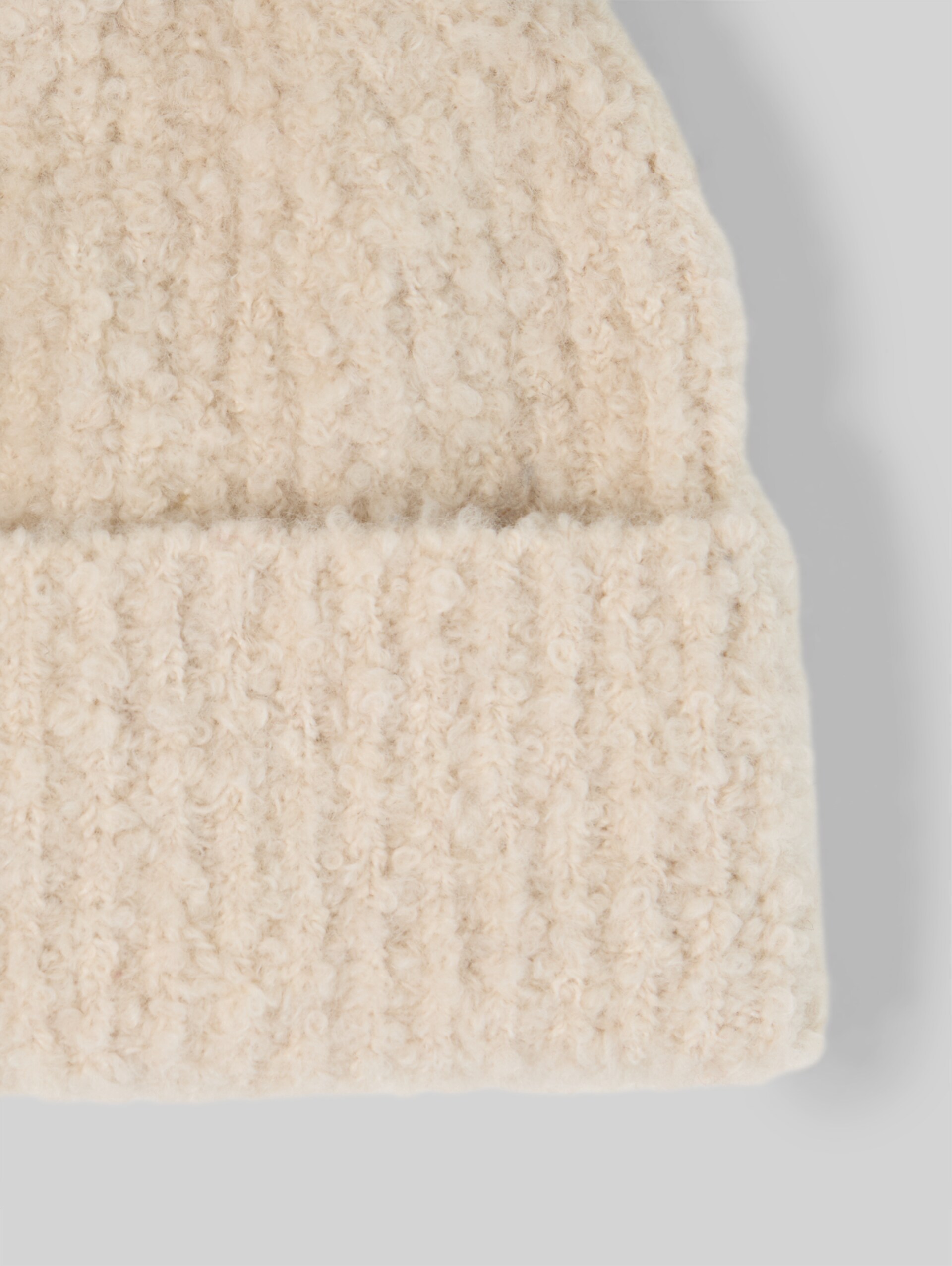 Bouclé-beanie - whisper offwhite melange - Materiaalweergave