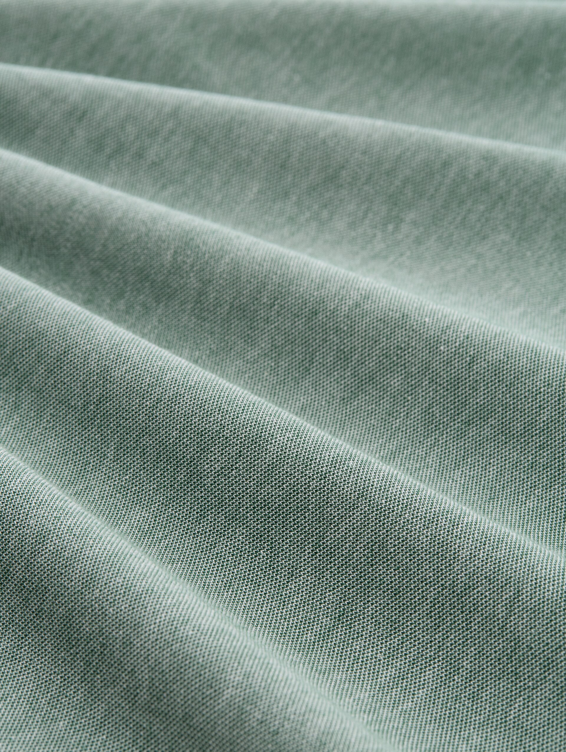 Piqué T-shirt in gemêleerde look - Garden Green - Materiaalweergave