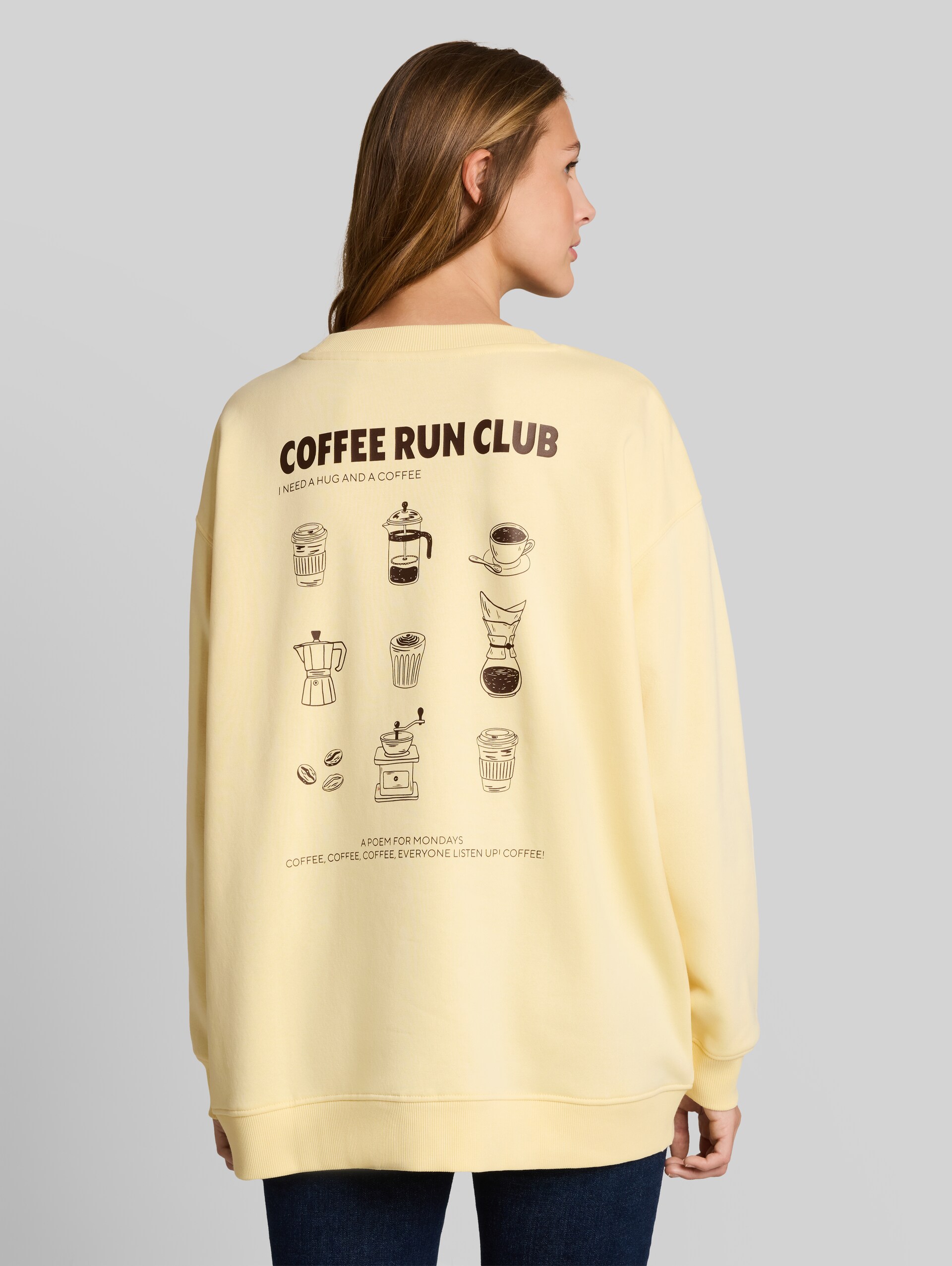 Oversized sweatshirt met print - soft vanilla yellow - Neklijn model-achteraanzicht