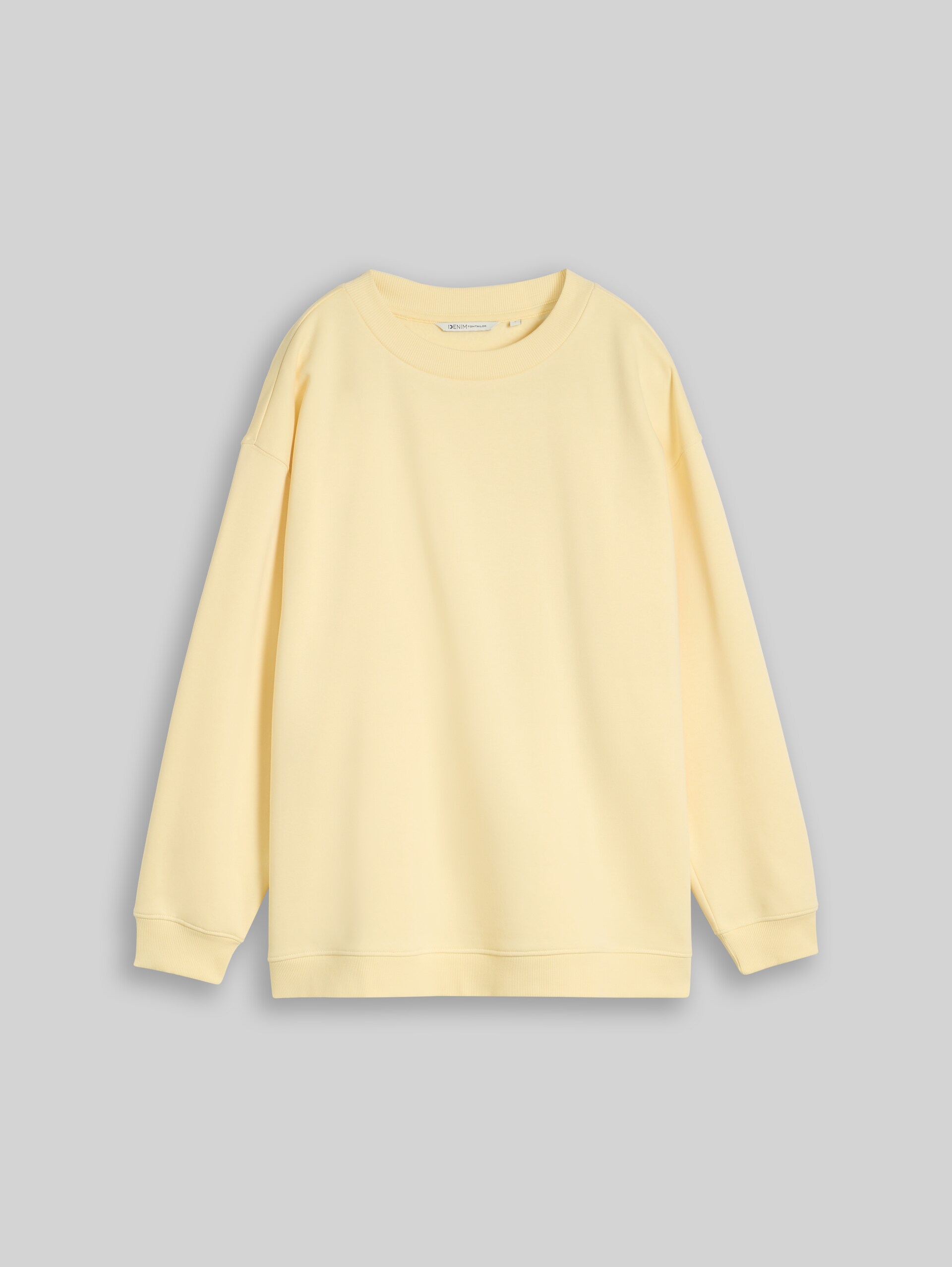 Oversized sweatshirt met print - soft vanilla yellow - Product vooraanzicht