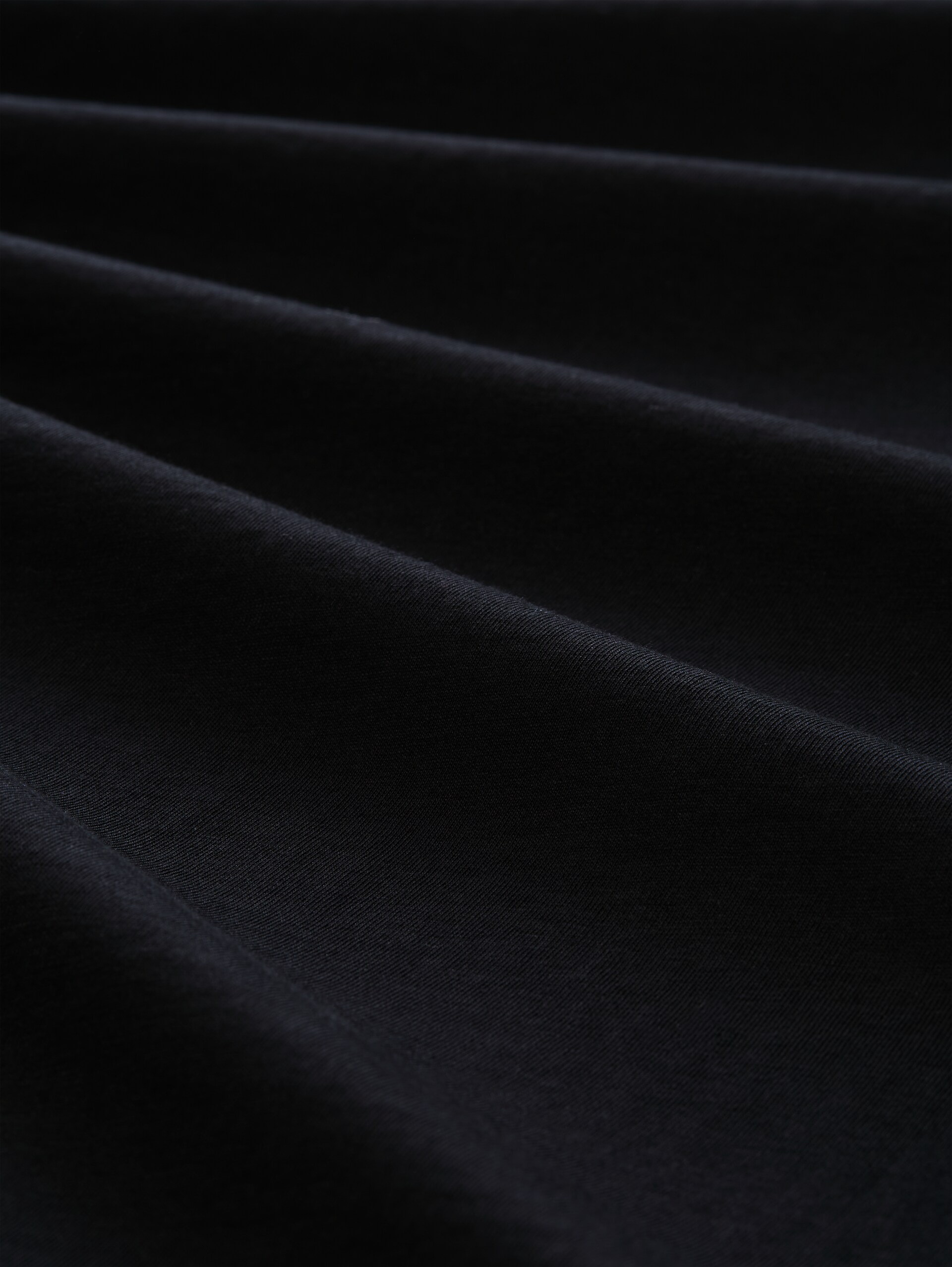 T-Shirt mit Print - Black - Material-Ansicht