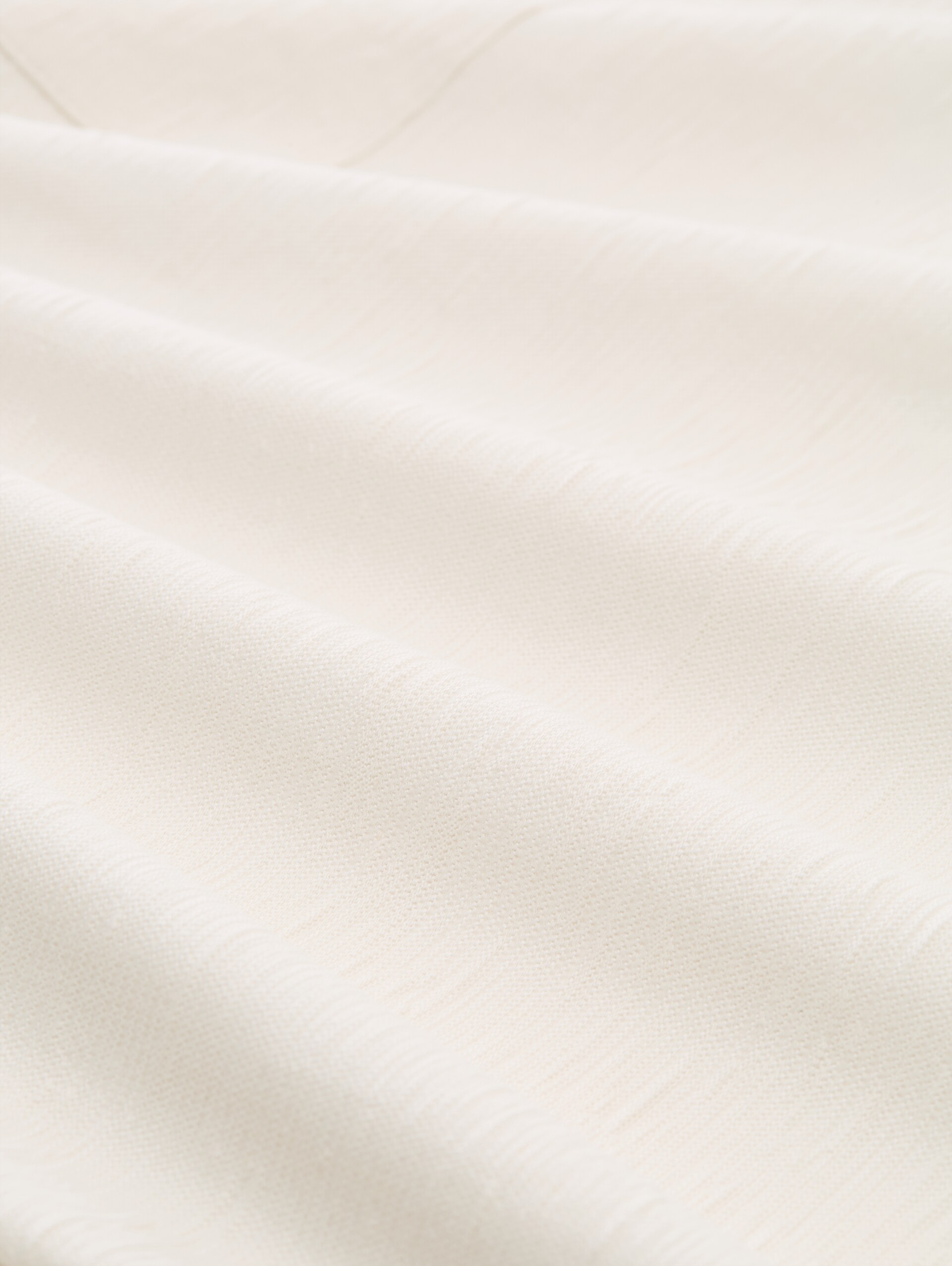 T-Shirt mit Brusttasche - Gardenia White - Material-Ansicht