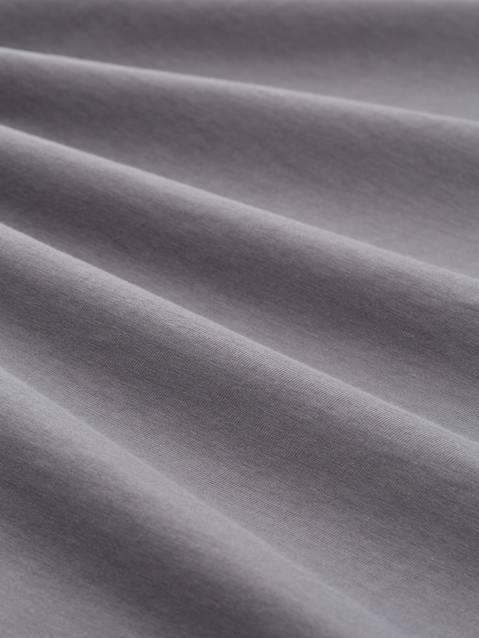 T-Shirt mit Print - classic grey - Material-Ansicht