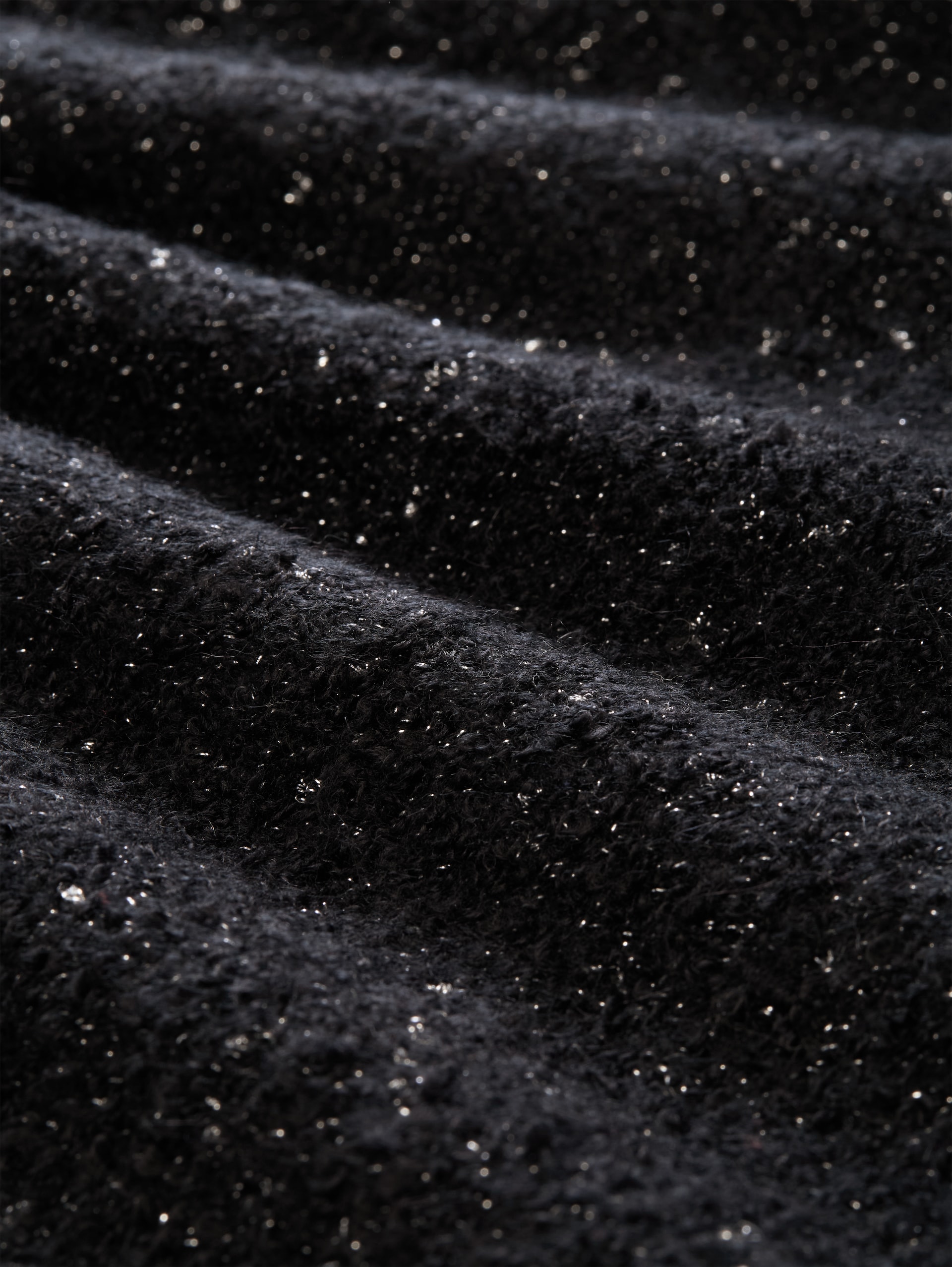 Losvallende gebreide trui met glittereffect - deep black - Materiaalweergave