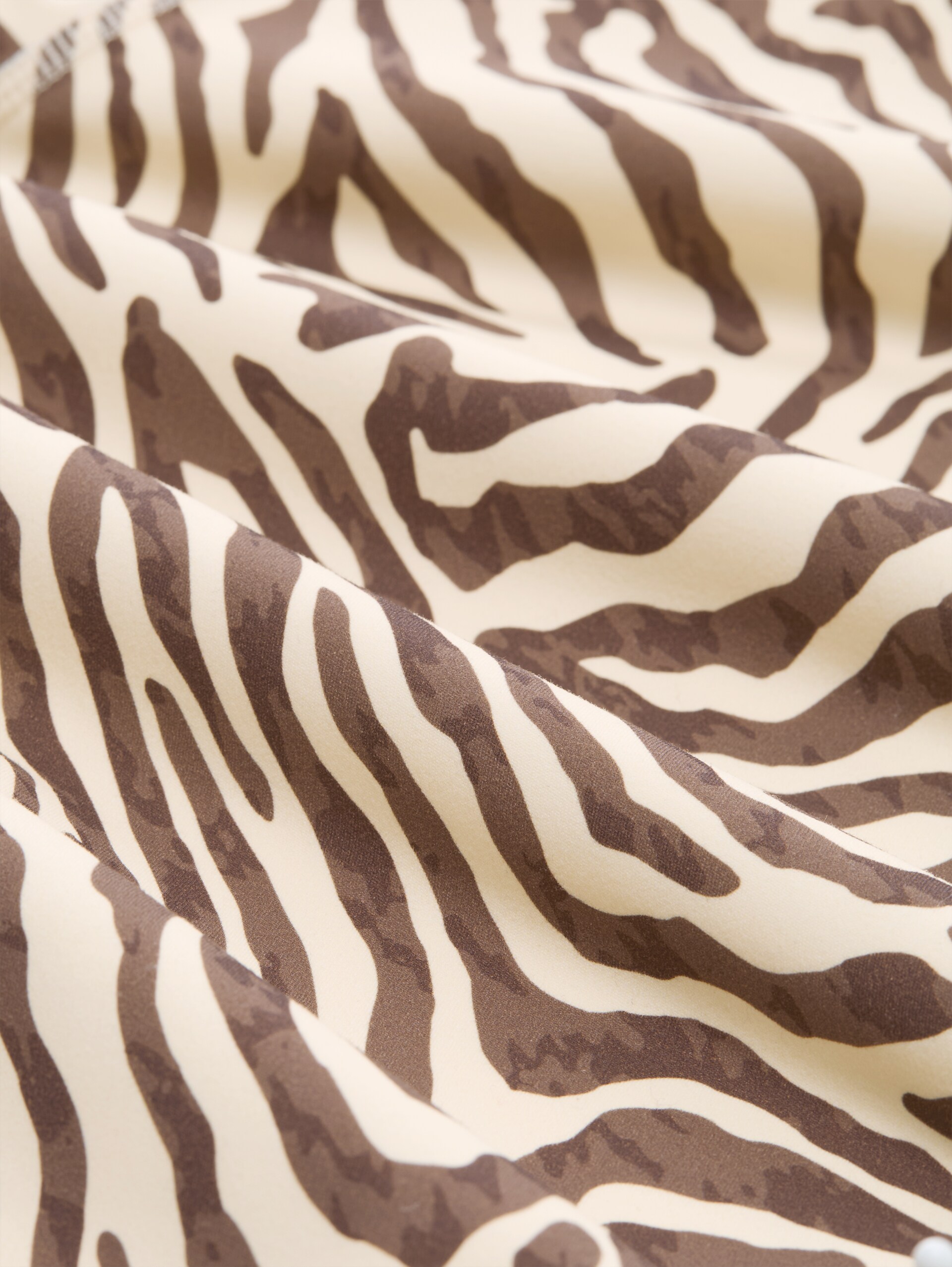 Sportlegging - brown beige zebra print - Materiaalweergave