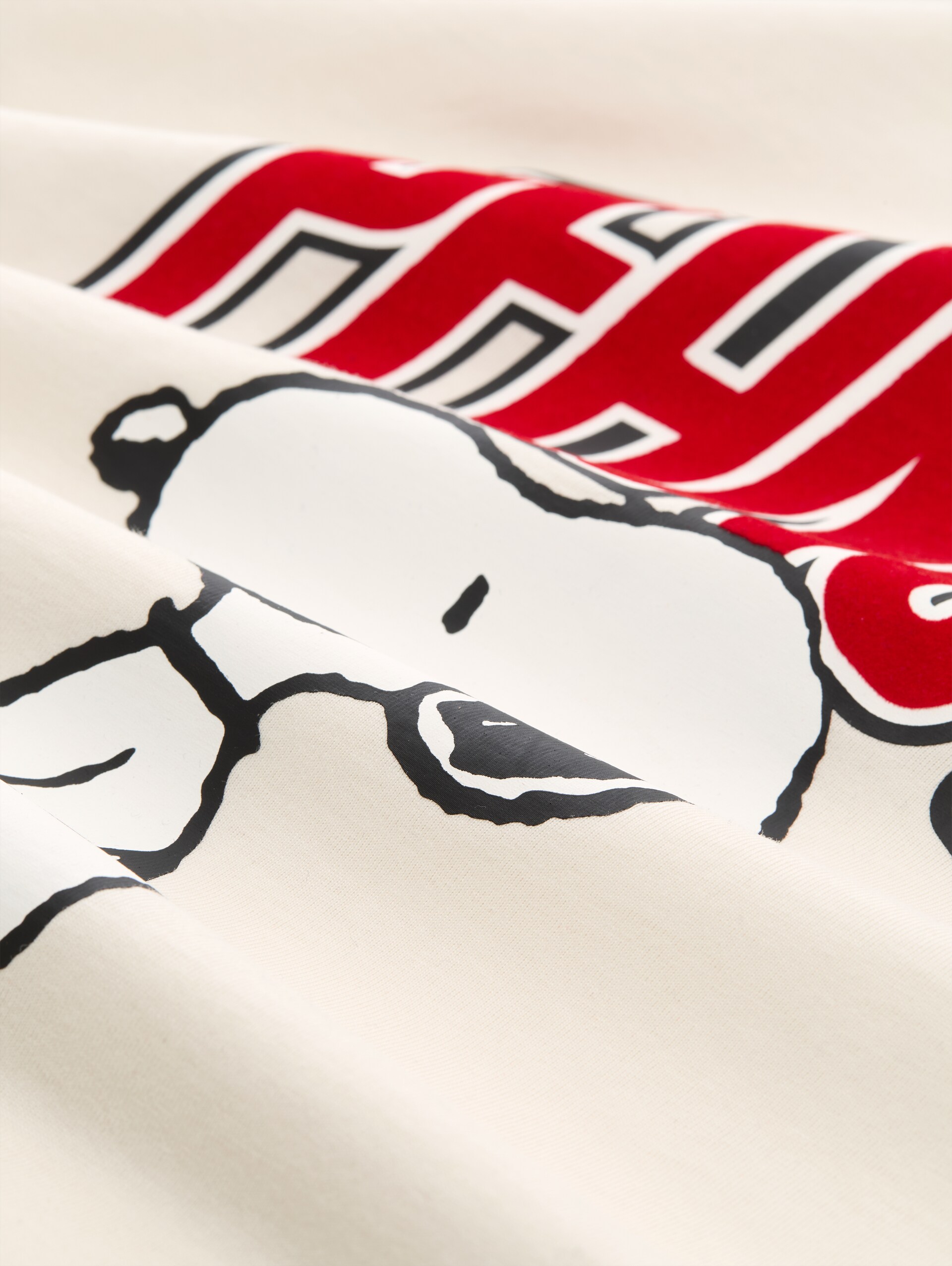 Relaxed Fit T-Shirt mit Snoopy-Print - Gardenia White - Material-Ansicht