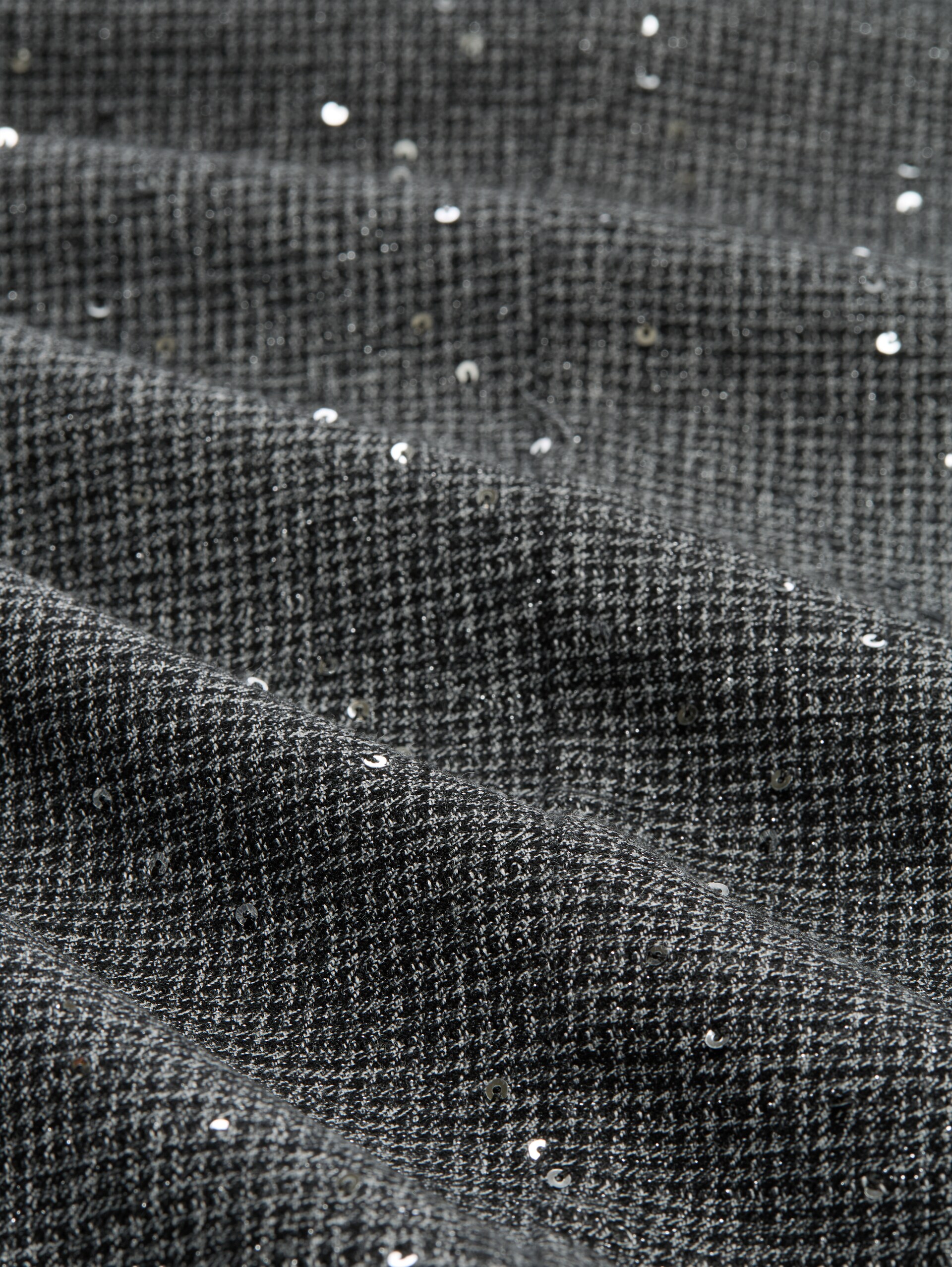 Pantalon à jambes larges à paillettes - black white sequins structure - Vue de la matière