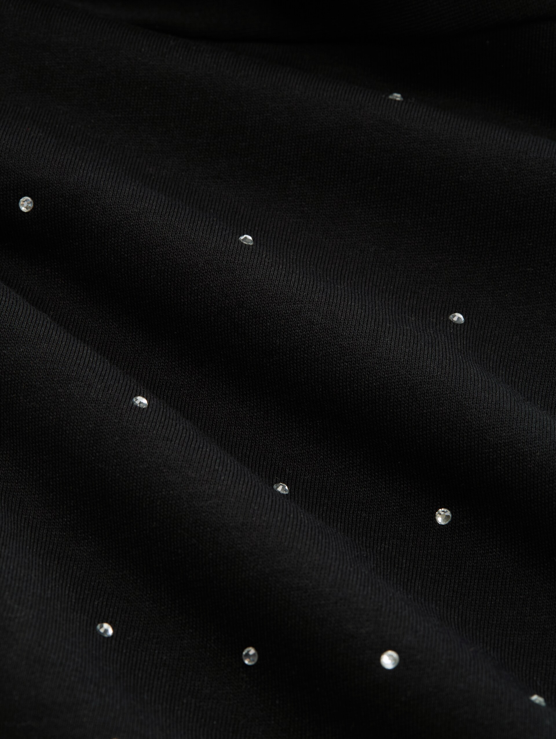 Sweatshirt mit Strasssteinen - deep black - Material-Ansicht