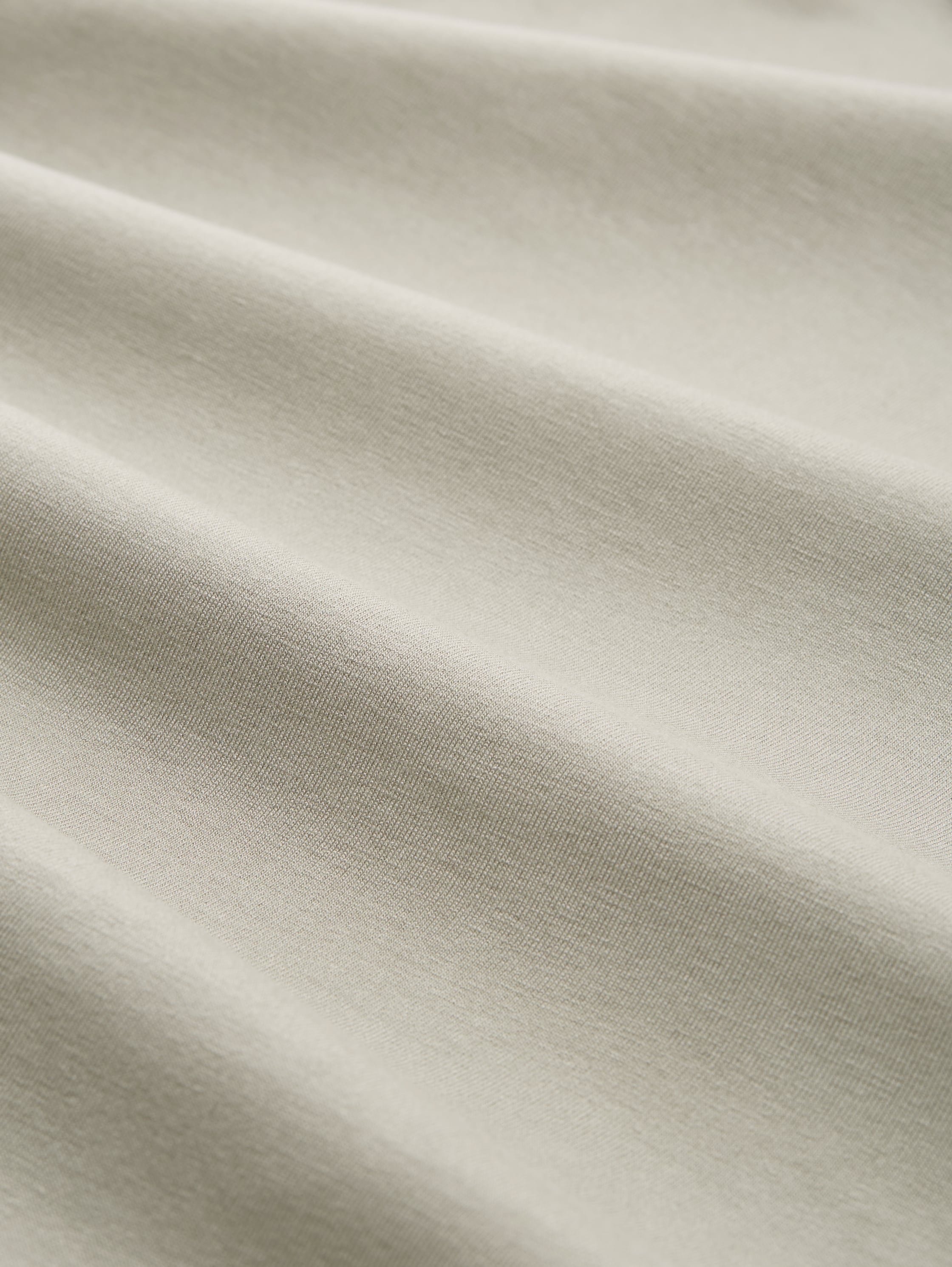 Vrouwelijke speelse top - green-medium-solid - Materiaalweergave