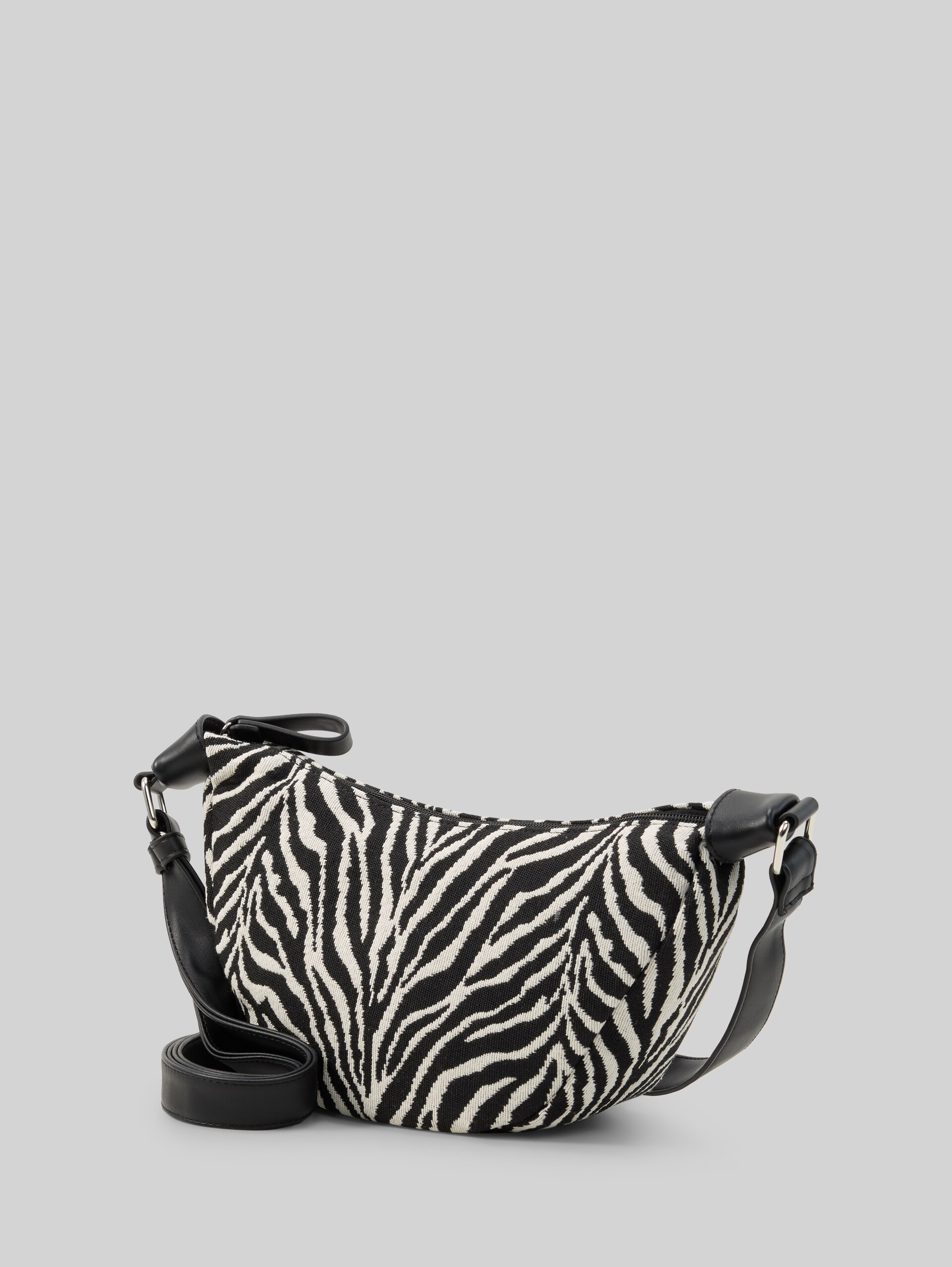 TTLIRIEL ZEBRA schoudertas - animal black - zijaanzicht product 